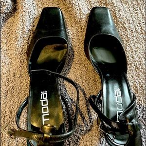 Flat toe, open-back pumps with ankle strap